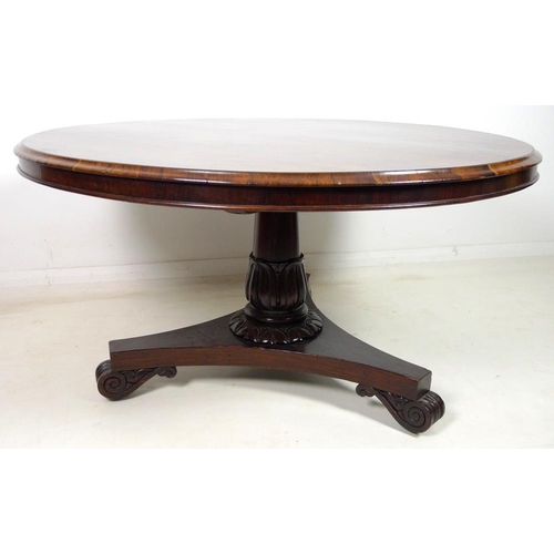 994 - A William IV rosewood breakfast table, the circular tilt top raised on a single pedestal with lappet... 