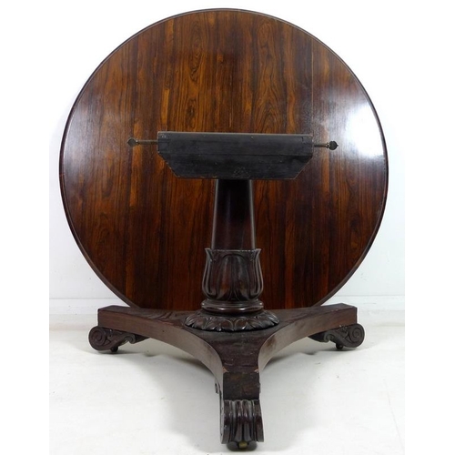 994 - A William IV rosewood breakfast table, the circular tilt top raised on a single pedestal with lappet... 