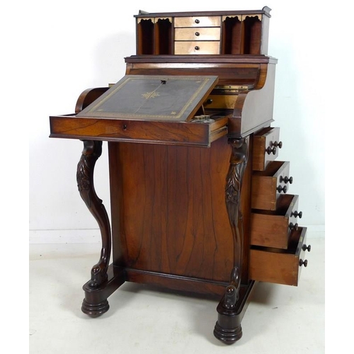 999 - A good Victorian rosewood Davenport desk, with pop up letter compartment, piano top shaped cover ope... 