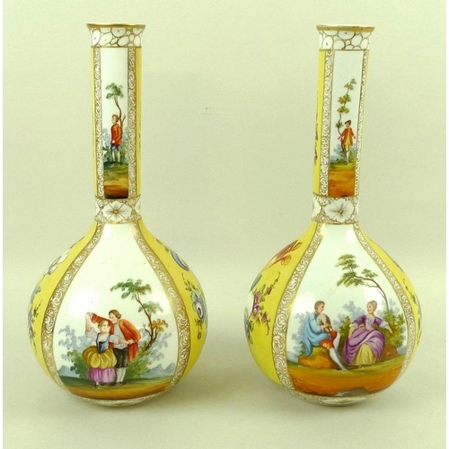 552 - A pair of Vienna porcelain bottle vases, late 19th century, decorated with yellow and white quartere... 