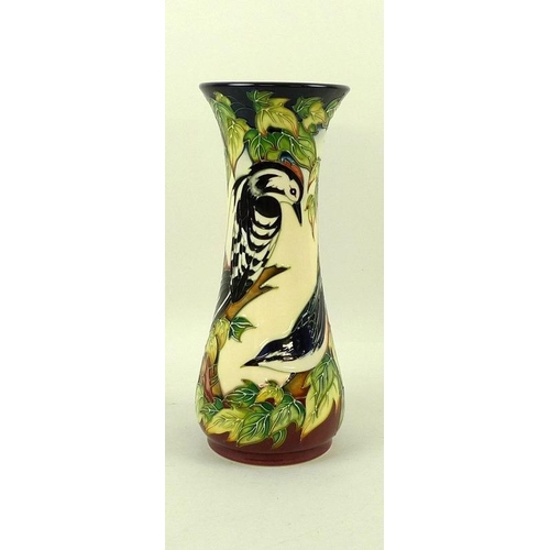 560 - A Moorcroft pottery vase of flared form, tube line decorated with birds, in the Ingleswood pattern d... 