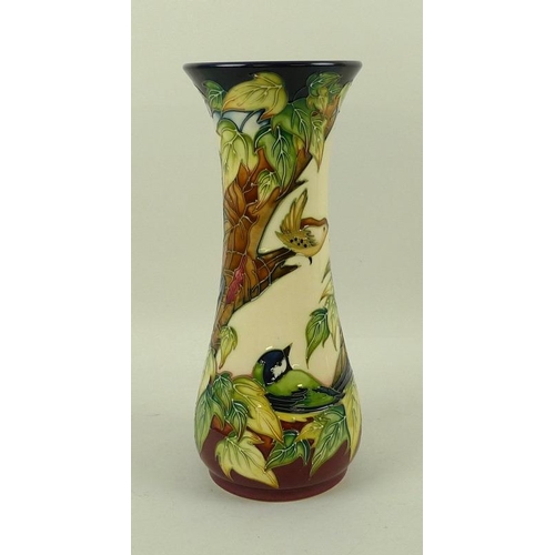 560 - A Moorcroft pottery vase of flared form, tube line decorated with birds, in the Ingleswood pattern d... 