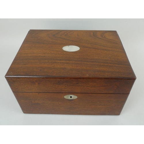 707 - A 19th century oak vanity case, fully fitted interior to include nine glass bottles with covers, a f... 