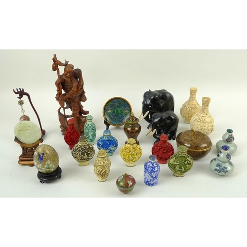 713 - A collection of 20th century Chinese ornaments, including a carved wooden figure of a fisherman, 21c... 