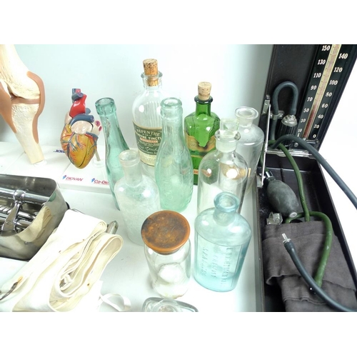 716 - A quantity of medical instruments, display models and medical bottles, mostly late 20th century. (q)