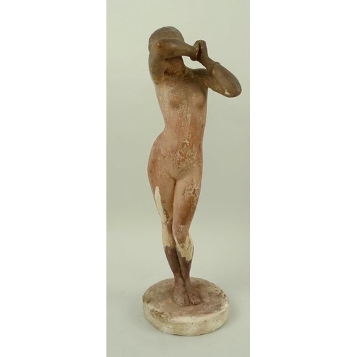 728 - A plaster figure of a nude woman, mid 20th century, modelled standing with hands clasped together an... 