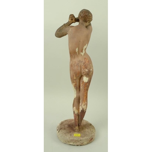 728 - A plaster figure of a nude woman, mid 20th century, modelled standing with hands clasped together an... 