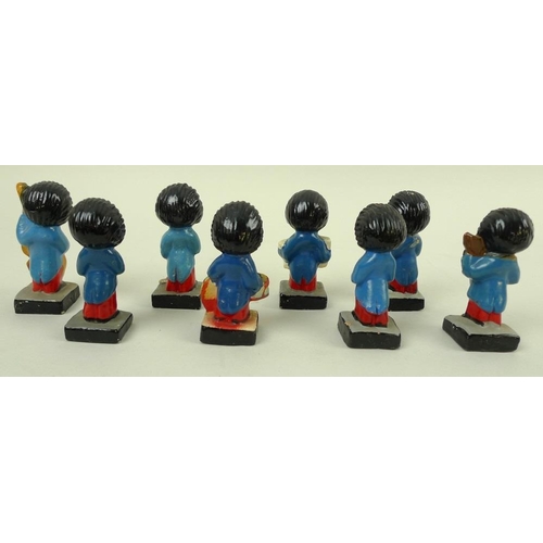 729 - A set of eight Robertson golly band figurines, comprising singer, guitarist, drummer, accordion play... 