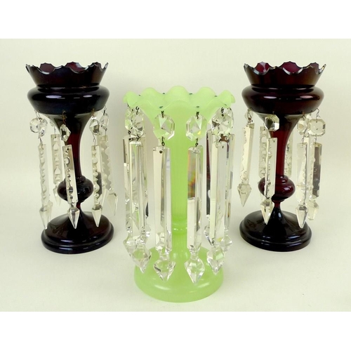 730 - A vaseline green glass lustre, 25.5cm, together with a pair of ruby glass lustres, 28cm, one a/f cra... 