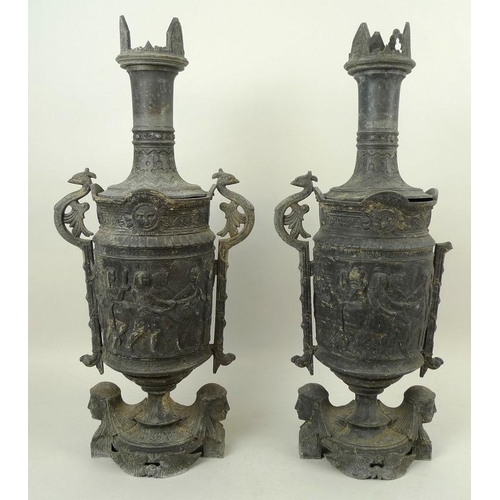 740 - A pair of cast metal urns and covers, circa 1930, possibly incense burners, with funnelled lids and ... 