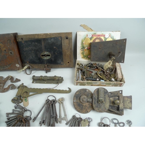 741 - A large quantity of keys, locks, latches, padlocks, 17th century and later, over 100 total.