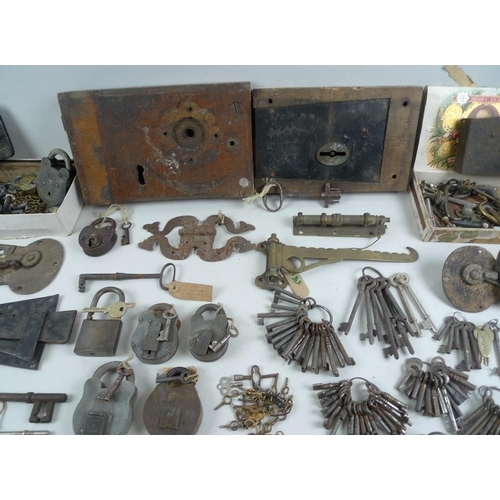 741 - A large quantity of keys, locks, latches, padlocks, 17th century and later, over 100 total.