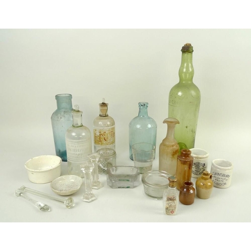 746 - A collection of mostly glass items including a pair of 19th century clear glass bottles with origina... 