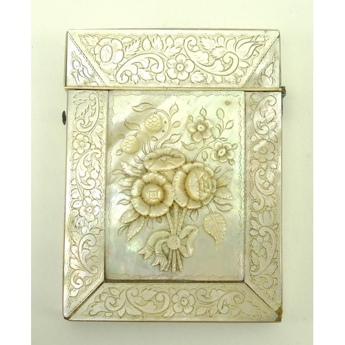 748 - A mother of pearl card case, 19th century, the central section carved with a raised spray of flowers... 