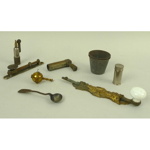 750 - A selection of items including a gilt brass door latch with white enamel handle, a second latch, the... 