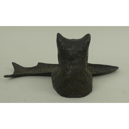 755 - A hollow cast patinated bronze desk tidy or tray, modelled as the upper half of a cat with paws rest... 