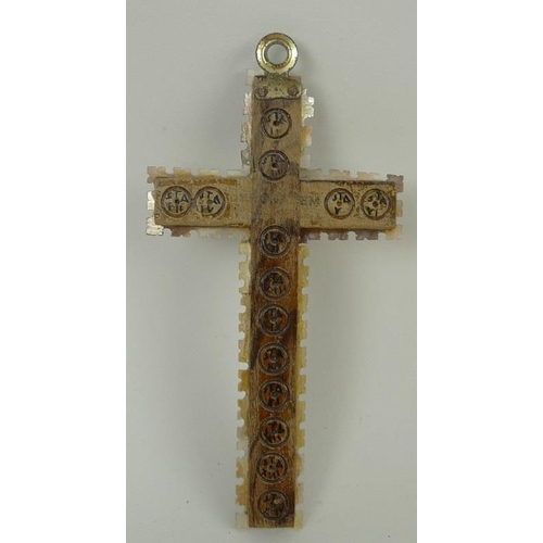 763 - An Italian mother of pearl and olive wood cross, pierced with green foil backing, 13cm, together wit... 