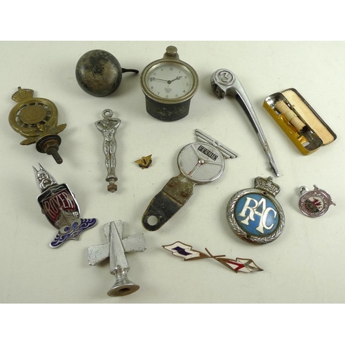 768 - A collection of automobile memorabilia including a 1940's Smith's car dashboard clock, 9cm, a Rover ... 