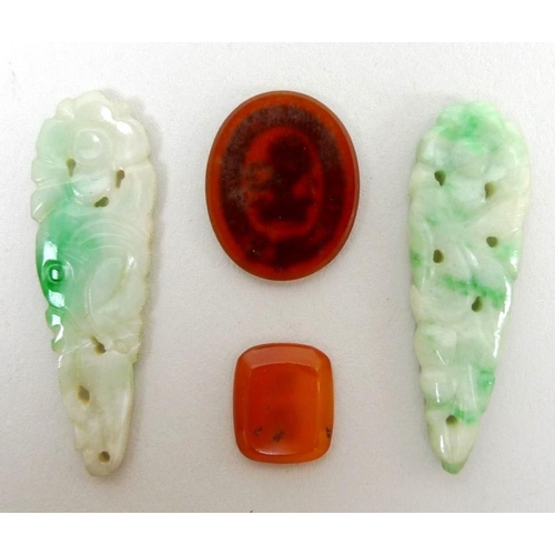 772 - A pair of jade carved and pierced drops, a/f one broken, together with an unmounted intaglio with co... 