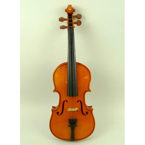 778 - A Stentor Student I violin, with a hard carrying case and two bows. (4)