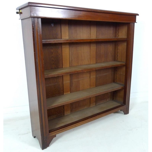 958 - An Aesthetic movement mahogany freestanding bookcase, circa 1900, with three adjustable shelves, 107... 