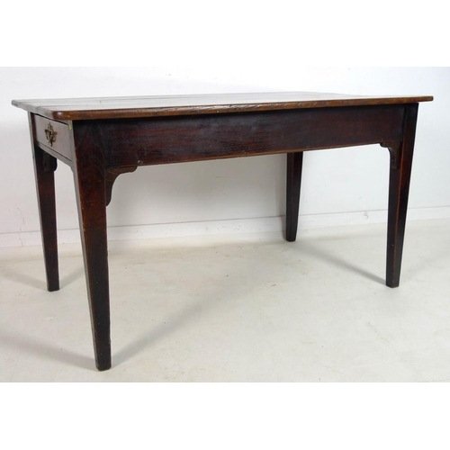 959 - An early 19th century oak table, possibly French, with three plank rectangular surface with rounded ... 