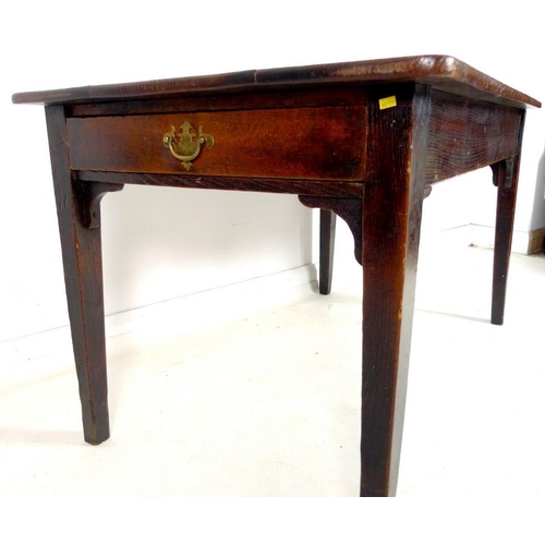 959 - An early 19th century oak table, possibly French, with three plank rectangular surface with rounded ... 