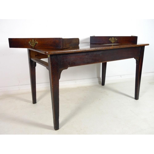 959 - An early 19th century oak table, possibly French, with three plank rectangular surface with rounded ... 