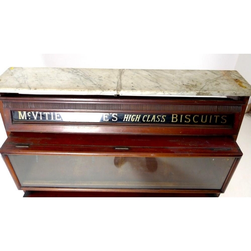 960 - An Edwardian mahogany advertising shop display unit, with glass name plate for 'McVitie & Price's Hi... 