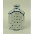 A Leeds pottery tea caddy, circa 1780, decorated in underglaze blue with line detail and overpainted... 