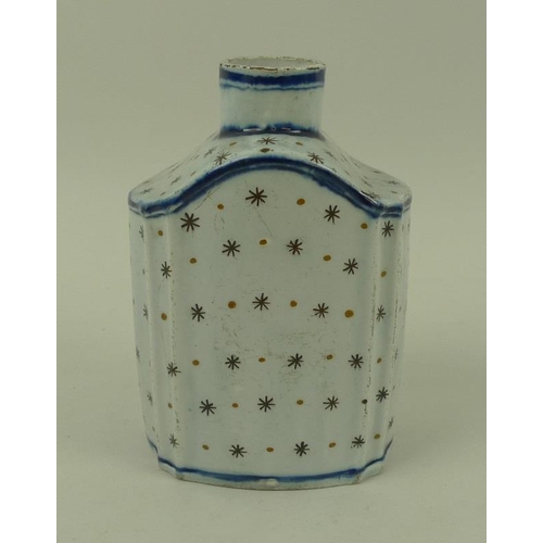 504 - A Leeds pottery tea caddy, circa 1780, decorated in underglaze blue with line detail and overpainted... 