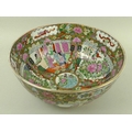 A Canton porcelain bowl, 20th century, decorated with interior scenes alternating with panels of bir... 