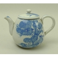 A late 19th century Japanese teapot, the blue and white body decorated with swallows and chrysanthem... 