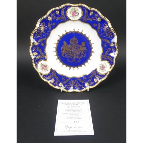 526 - A group of Royal Crown Derby plates, comprising a fluted plate in the Old Imari pattern 1128, dated ... 