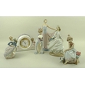 A group of six Lladro figurines, comprising Two Sisters Clock, 5776, 16 by 31cm, The Dancer, 5050, 3... 