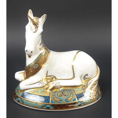 532 - A Royal Crown Derby paperweight, Unicorn, printed mark, gold stopper, limited edition 1337/200, with... 