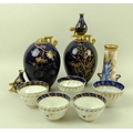 A pair of late 18th century Worcester tea bowls, the wrythen moulded bowls with blue and gilt harebe... 