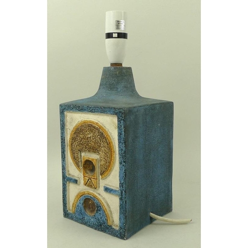 564 - A Cornish Troika table lamp, the blue body decorated with modernist abstract design, with written ma... 