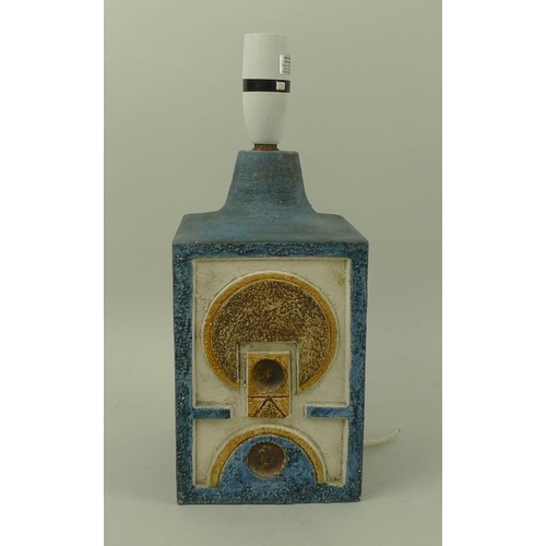 564 - A Cornish Troika table lamp, the blue body decorated with modernist abstract design, with written ma... 