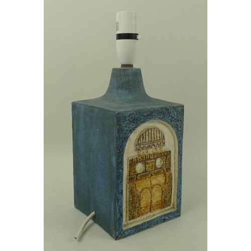 564 - A Cornish Troika table lamp, the blue body decorated with modernist abstract design, with written ma... 