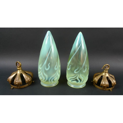 567 - A pair of Art Nouveau vaseline glass shades, of slender teardrop form, with floral decoration, open ... 