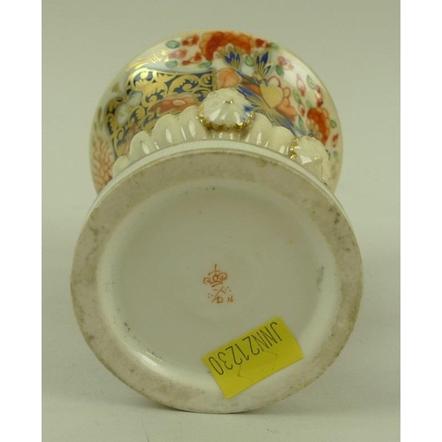 569 - A pair of early 19th century Derby porcelain cups and saucers, decorated in the Imari pattern, one s... 