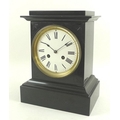 A black slate mantle clock, late 19th century, white enamel face, black Roman numerals and minute ma... 