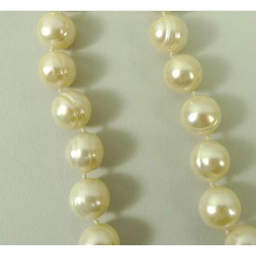 814 - A string of one hundred and twenty Chinese ringed pearls, pearls each approximately 10mm diameter, 1... 