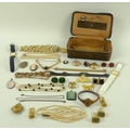 A collection of vintage and later costume jewellery comprising an early 20th century bangle set with... 