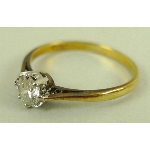 827 - A gold and diamond solitaire ring, platinum claw set, approx 0.4ct, marks rubbed, size Q 1/2, 2.3g.