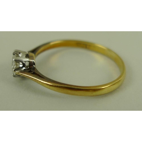 827 - A gold and diamond solitaire ring, platinum claw set, approx 0.4ct, marks rubbed, size Q 1/2, 2.3g.