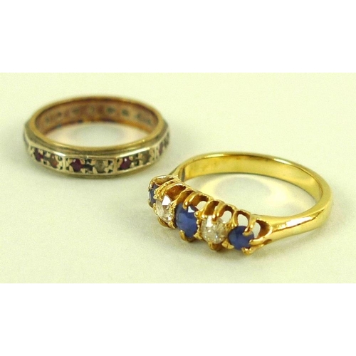 833 - An 18ct gold, diamond and sapphire five stone ring of three sapphires and two diamonds, size M, 3.7g... 