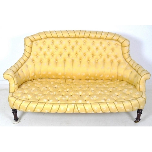 925 - A 19th century three seater settee, possibly French, arched and shaped back and bowed front, upholst... 