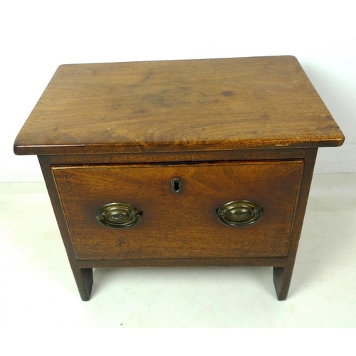 926 - A Regency mahogany slipper box, single drawer with embossed brass oval plate handles, 46 by 28 by 38... 